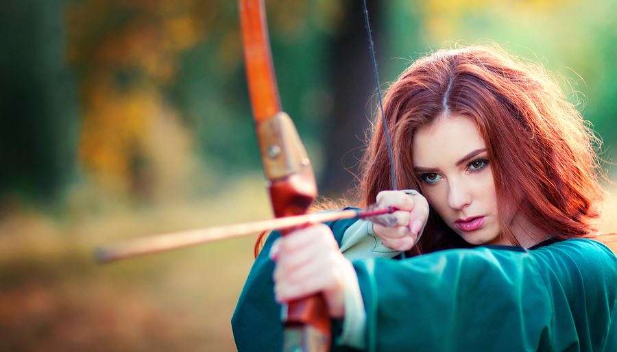 Sagittarius-Zodiac-Sign Red Haired Woman Archer Shooting Bow & Arrow