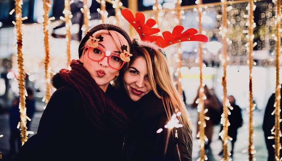 Christmas-Life-Path Two Female Friends Outside Celebrating Christmas