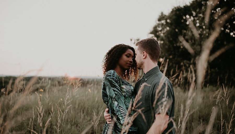 Venus-in-Capricorn Romantic Couple in Field at Dusk