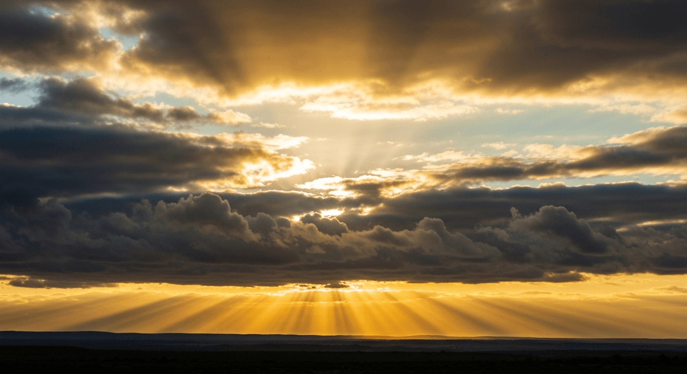 Sun breaking through storm clouds, wide landscape. Sun breaking through storm clouds, wide landscape.